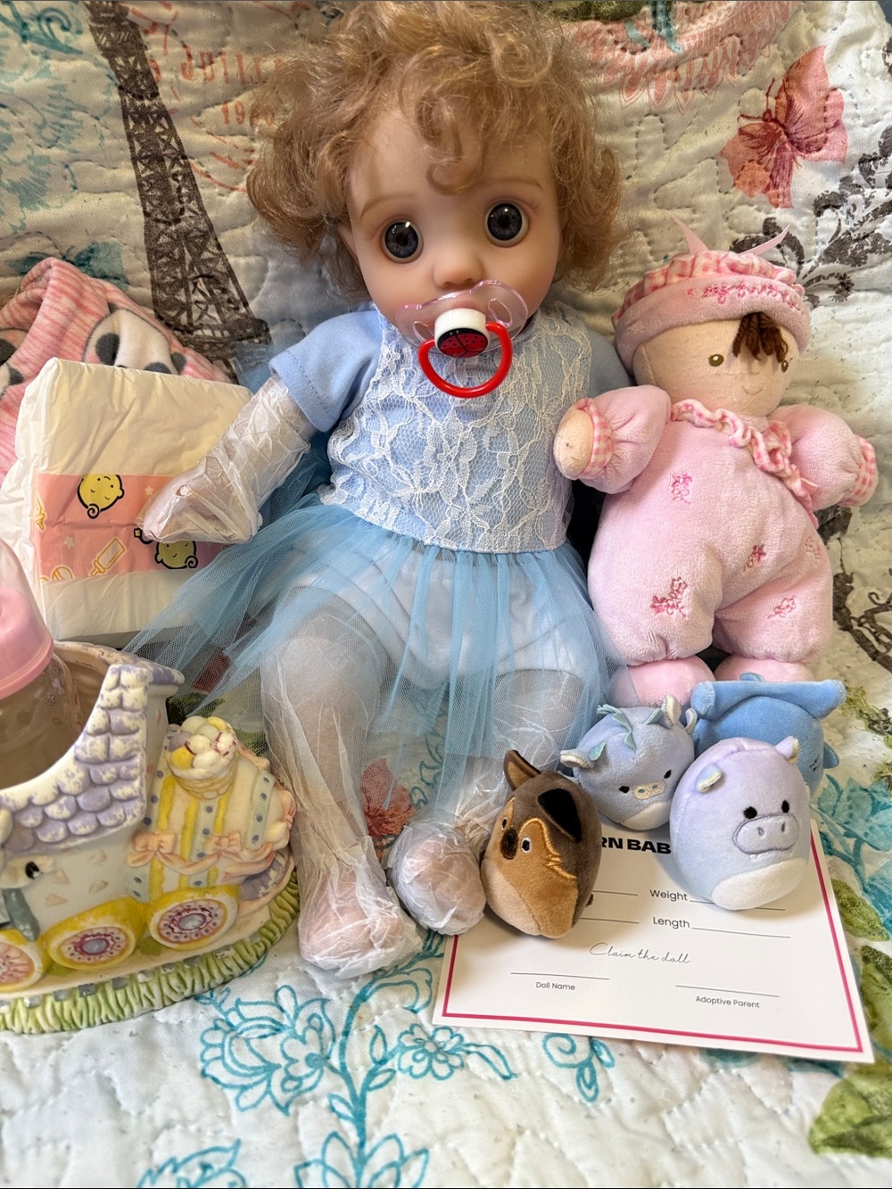Reborn Blue-Eyed Baby Doll with Curly Hair